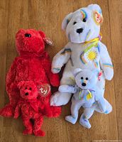 Group shot of all four bears showing sizes, colors and tags