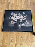 Front view of framed floral canvas painting