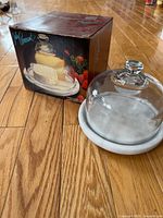 tray with dome next to original box