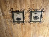 both metal palm tree panels side by side showing full frames