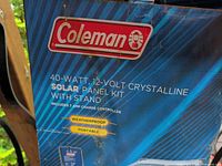 Box front showing Coleman branding, wattage, voltage and kit contents