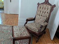 Rocking chair and ottoman showing overall design and upholstery