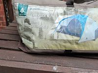 Brand label showing Woods logo and Creekside 8 model