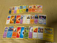All 30 Pokémon cards laid out in three rows