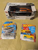 All three packaged toy items laid out