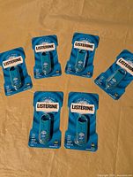 Six unopened Listerine Pocketmist blister packs