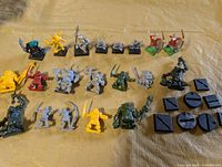 Group shot showing all plastic miniatures and spare bases
