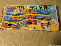 Top of Matchbox Super Garage box showing artwork of multilevel garage