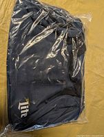 Bag sealed in plastic, front view