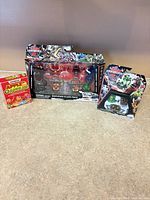 Group shot of all three sealed items