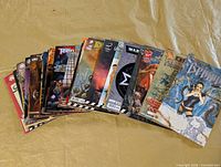 Fan arrangement showing the full lot of comics