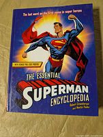 Front cover showing title, authors, bonus poster note