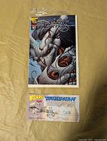 Bagged special edition comic with certificate displayed below