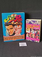 Front covers of both books upright