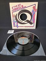 Front view of sleeve and vinyl record