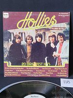 Front album cover showing title and band photo