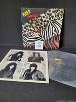 Front jacket, vinyl record, and inner sleeve displayed