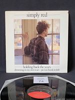 Front of picture sleeve showing artwork and title