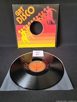 Front of generic GRT Disco sleeve with vinyl partially removed