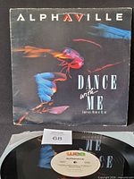 Front sleeve of Alphaville Dance With Me 12" single with record partially visible