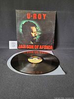 Front view of jacket and record