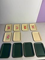 Top view of all trays arranged in two rows showing cream and green varieties