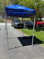 Canopy fully assembled showing size, color, branding, frame