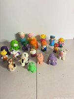 Group shot of all 18 Fisher-Price Little People figures