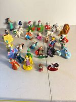 Full group of Disney character and Dalmatian figures