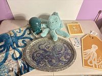 All octopus-themed items grouped on table