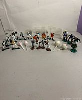 Group shot of all figurines, goals and ball picks on tabletop