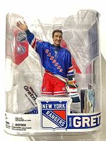 Front view of sealed Wayne Gretzky action figure in package