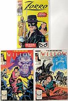 Front covers of all three bagged and boarded comics