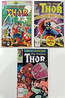 Front covers of all three Thor issues laid out together