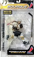 Front of sealed McFarlane Ray Bourque action figure packaging with figure and accessories visible