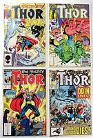 All four Thor comic issues laid out together