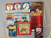 Front covers of all 15 books laid out