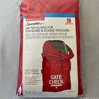 Front of sealed package showing red Gate Check bag, branding and size information