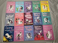 Front covers of all 15 books displayed in grid