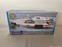 Front of box showing Pyle PLMRMP3A 4-channel waterproof marine amplifier graphics