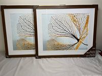 Front view of both frames with mats and artwork insert