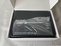 Switch unit in protective plastic inside box