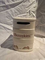 Spine view showing Bunnykins lettering and coin slot