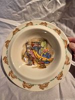 Top view of Bunnykins cereal bowl showing interior scene and rabbit border