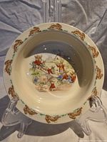 Top view of Bunnykins cereal bowl showing interior scene and border