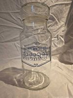 Front view showing MACARONI graphic and overall jar form