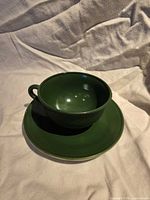 Teacup nested in saucer, overhead view