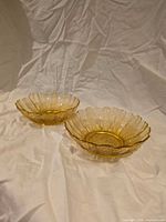 Two amber Indiana Glass bowls overview