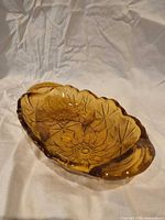 Top view showing full oval shape, floral pattern and handles