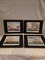 All four Pimpernel placemats displayed